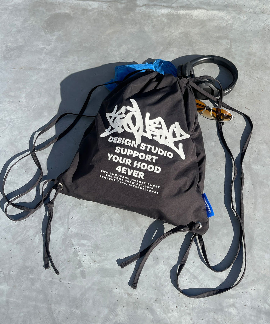 SEQUENZ 2 FACE STRING KNAPSACK / リバーシブル テック ナップサック